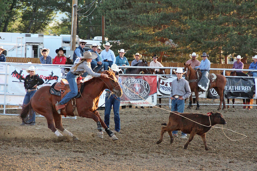 Hadley Thompson of Yoder ropes a calf in breakaway roping at the final high school rodeo of the season in Buffalo in early June. Thompson punched her ticket to compete in four events at the NHSFR.