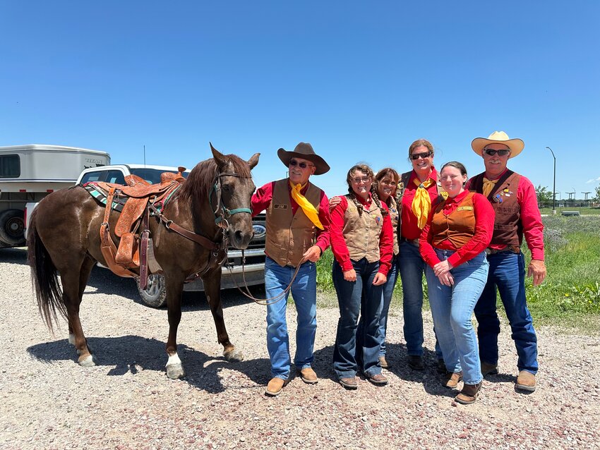 Pony Express Association members pose with horses and authentic equipment during the re-ride through Goshen County. The annual event honors the legacy of mail carriers who braved harsh conditions to deliver correspondence across the American West.