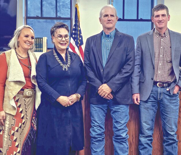 Platte County Commissioner Kayla Mantle (l-r) welcomes Congresswoman Harriet Hageman, along with Commissioners  Steve Shockley and Ian Jolovich, during their bi-weekly session.
