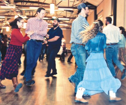 Stephanie Wilson/PC Record-Times
Couples promenade during the 4-H square dance in Wheatland this weekend.