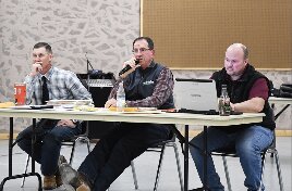 Chairman Michael McNamee (middle) addressing the audience during the public meeting on Monday. Commissioners Aaron Walsh to the left and Justin Burkart to the right.