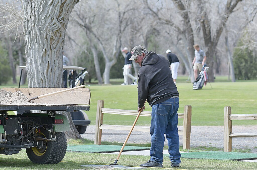 The maintenance crew at the Cottonwood at Torrington Golf Course were hard at work behind the scenes while the action was taking place last week making both the Eastern Wyoming College and Torrington High School golf tournaments possible. Andrew Towne/Torrington Telegram