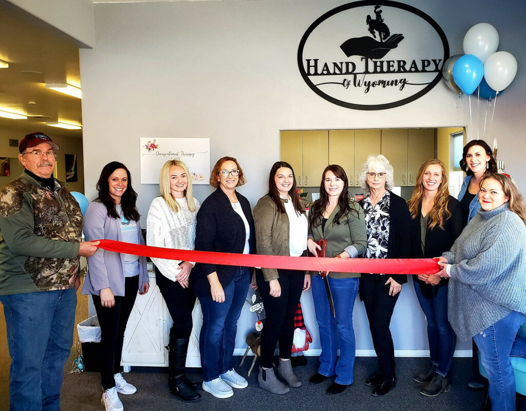Hand Therapy of Wyoming held their grand opening, open house and ribbon cutting Dec. 16. The Platte County Chamber of Commerce welcomed them on behalf of the community and wished them great success. Daryl Tiltrum, left, Hannah Foley, Shayna Carpenter, Kelly Klein, Becca Valleroy, Lyndsie Fuller, Jaimie Egger, Val Ames, Maggie Oliver and Kathy Anderson.