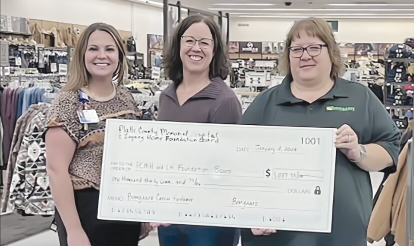 From left pictured are Rachel Ellis, PCMH Human Resources, Shannon Durick, Foundation Board member, Amy Crawford, Store manager at Wheatland Bomgaars January 3, 2023