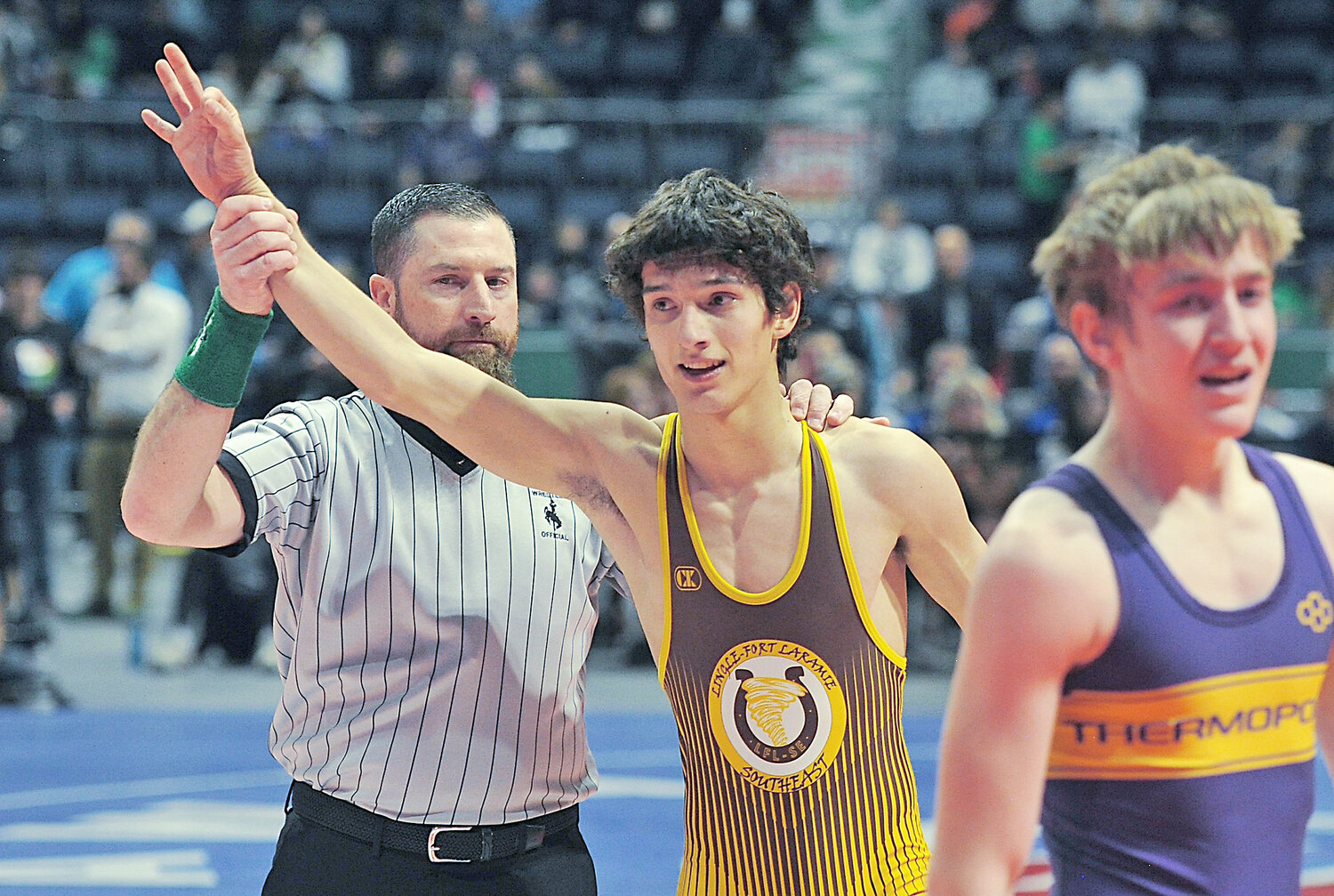Junior Nathan Fish secured the state championship at 120 pounds.