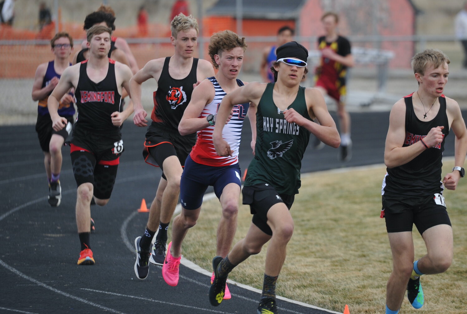 Sophomore Sullivan Wilson, center, steadily moves up to the front of the pack in the 1600-meters. Wilson garnered gold in the event.