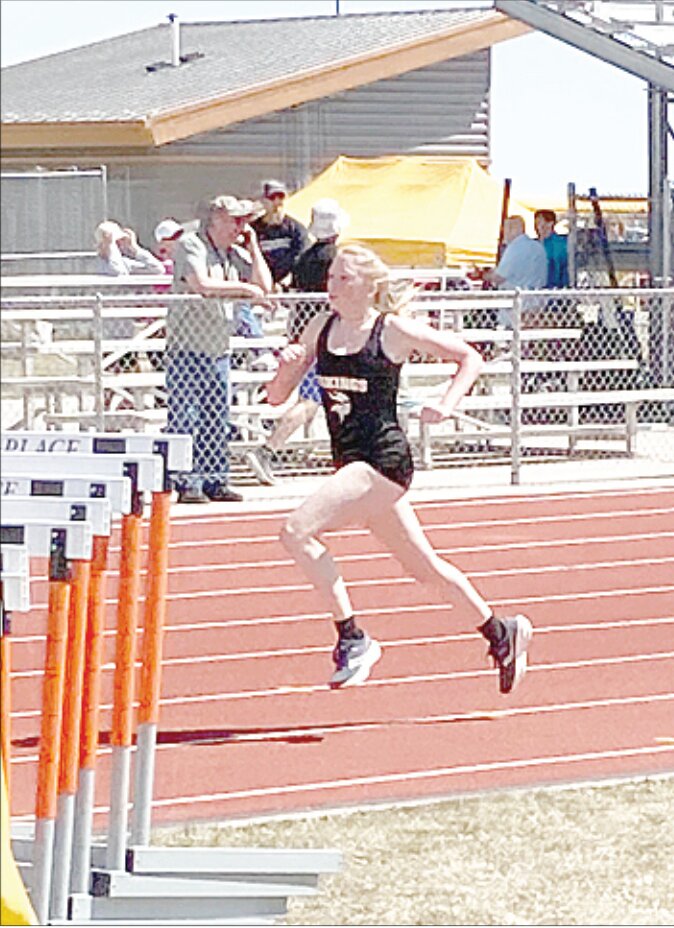Courtesy Photo/Laura Burfeind
Alyssa Nyquist turns up the speed in the 1600 Meter Run at the Pine Bluffs meet on April 12th.