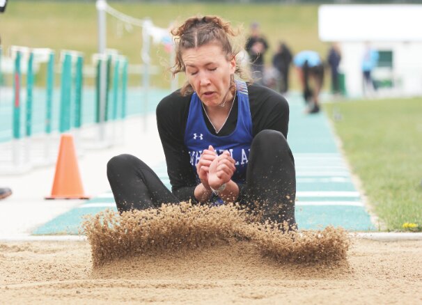Lily Nichols hits pay dirt in a long jump attempt at the Wyoming Track and Field Classic in Casper Friday. Nichols placed second with a leap of 17-05.25.jump at the Wyoming Classic.