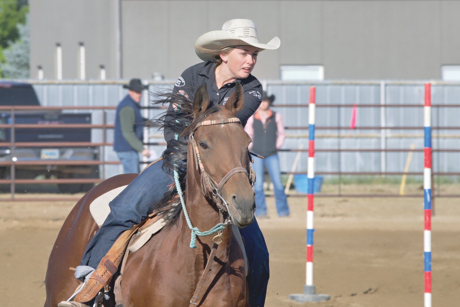 Rylee Griffis competes in pole bending at a rodeo last fall.