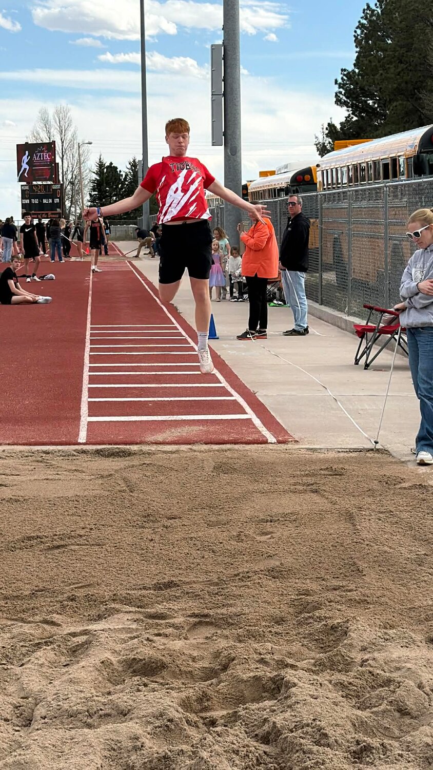 Tracksters Run Under the Lights at Burns