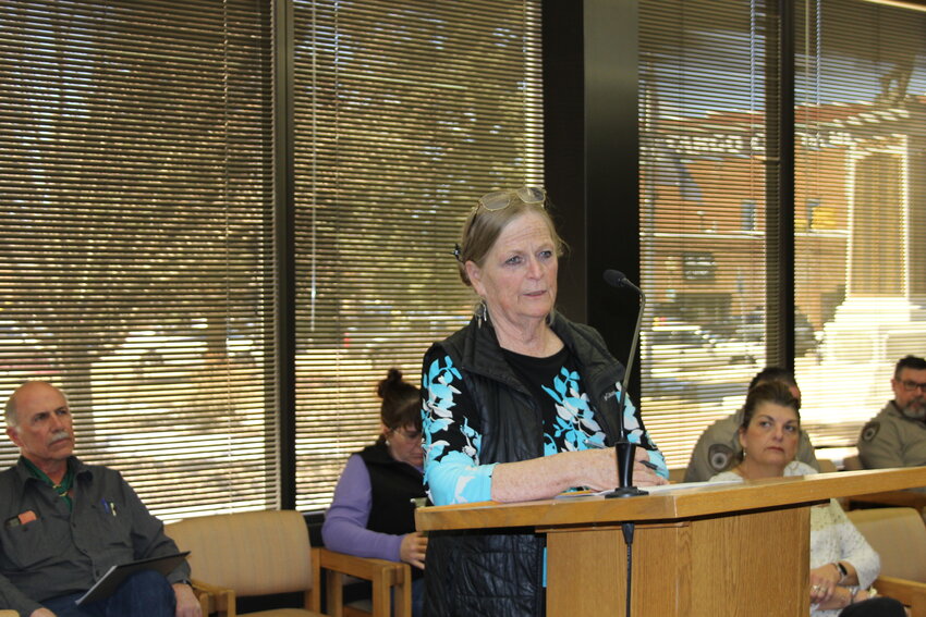Uinta County Library director Claire Francis asks commission approval to accept grant monies from Wyoming Department of Administration and Information for the library.