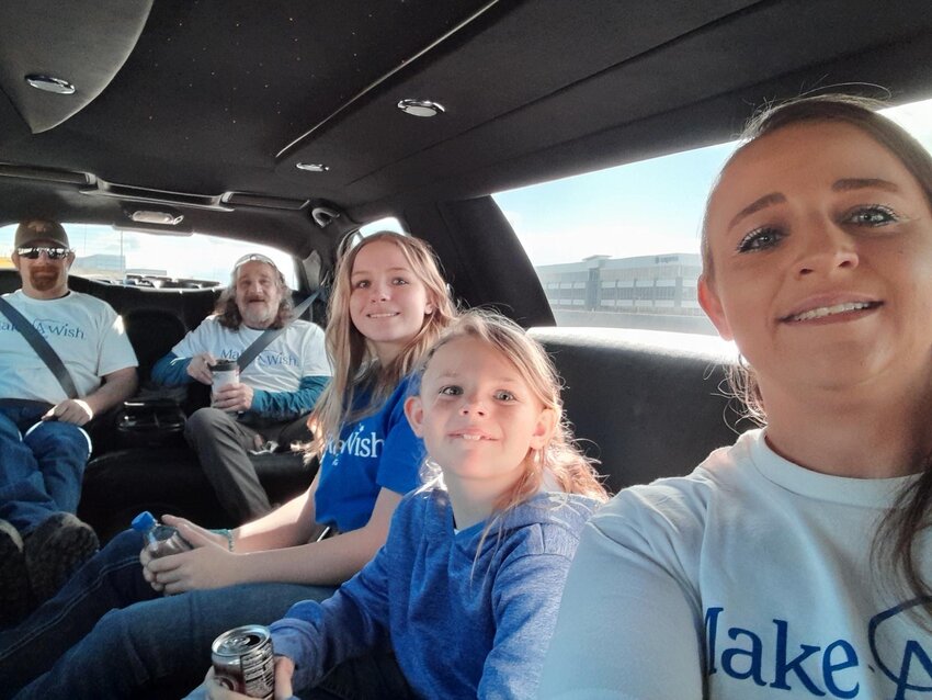 Caristel Johnson, far right, takes a group selfie with her family during her daughter’s Make-A-Wish outdoors shopping spree, which included a ride in a limousine. Fourteen-year-old Kaydence (center) was LifeFlighted to Salt Lake City at just two days old and was diagnosed with a critical respiratory condition.