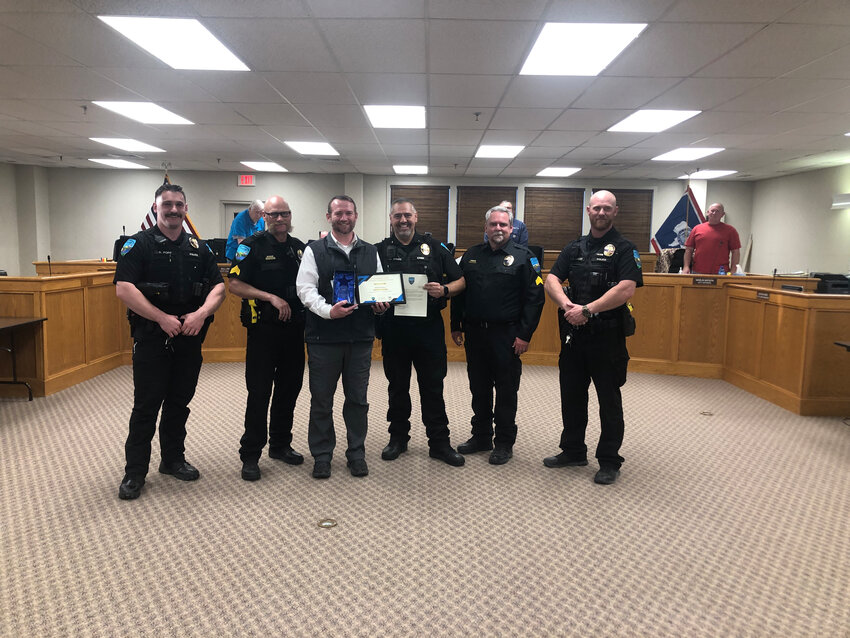 Kemmerer officials present Kemmerer High School Principal Shawn Rogers with the annual Citizen of the Year award during last week’s Kemmerer City Council meeting. Pictured are Officer Ryan Popp, Sgt. Jake Walker, Citizen of the Year Shawn Rogers, Chief of Police Mike Kahre, Sgt. Josh Hagler and Officer James Reeder.