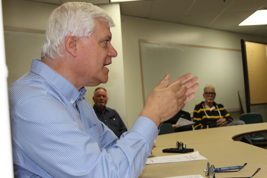 Peter Liguori with the Wyoming Horse Racing Association cites statistics for the economic benefit the Horse Palace off-track betting facility will bring to Evanston during a Uinta County Economic Development Commission meeting.
