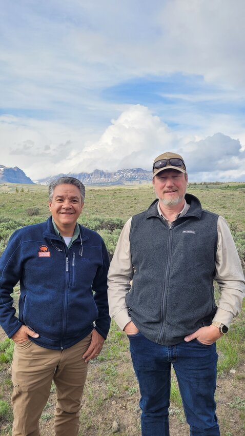 Wyoming Office of Outdoor Recreation manager Mark Tesoro and Wyoming Deputy Director of State Parks and Cultural Resources Chris Floyd take a break  in the field for a photo. The two are based in Evanston. Tesoro was a longtime publisher of the Herald, and Floyd is former superintendent of the Fort Bridger State Historical Site in the Valley.
