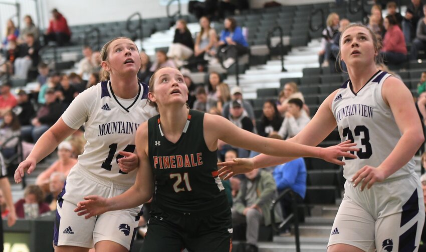 Sophomore Alyxis White, No 21, works to box out her opponents from Mountain View. She earned 3A West All-Conference honorable mention for her contributions to the team throughout the 2023-24 season.