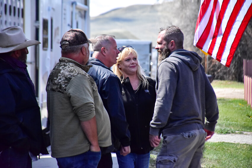 A verbal altercation breaks out between Sublette County residents and Hogs for Hope supporters who came to Daniel for what was billed as a peaceful protest. Pictured in the center is Tori Smith, who moments earlier was in tears after reportedly discovering a dead coyote near the Green River Bar, her husband Tony Smith to her immediate left, local residents Mitch Gilliam, left, and Lonny Johnson, far left. 