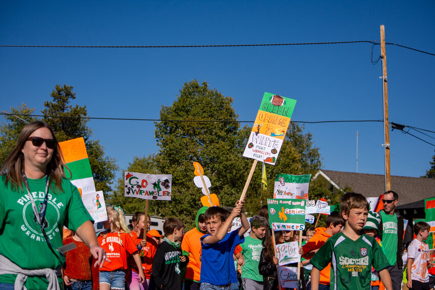 Students of all ages show their support for the Wranglers during the Homecoming Parade. 