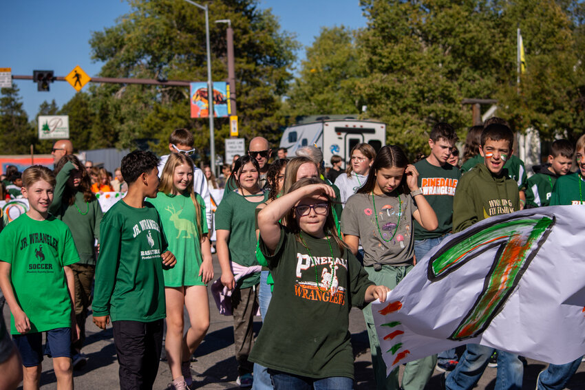 Students of all ages show their support for the Wranglers during the Homecoming Parade. 