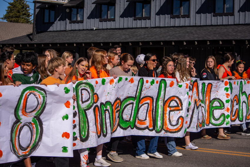 Students of all ages show their support for the Wranglers during the Homecoming Parade. 