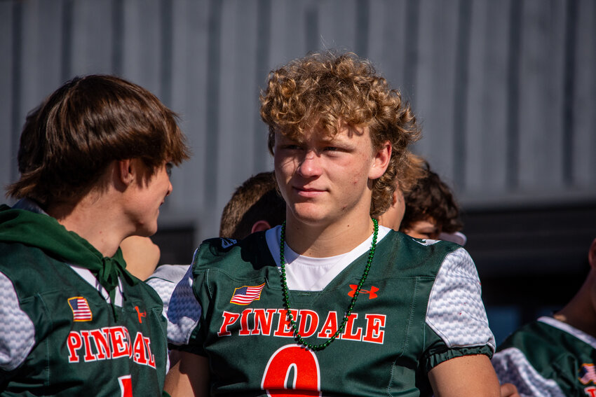 Members of the PHS Wrangler football team engage with spectators during the 2024 Homecoming Parade on Friday, Sept. 20. 