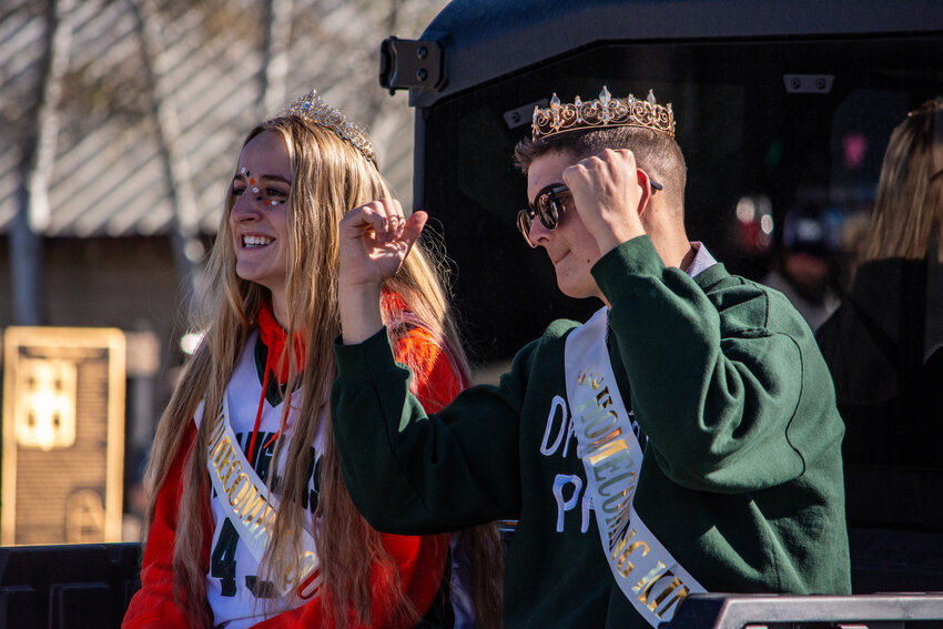 PHS Homecoming King Branson Simmons and Queen Mae McGuire ride through downtown Pinedale.