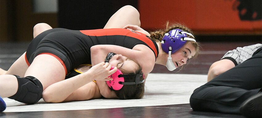 Lady Ranger Kaylie Julander looks to the referee for confirmation of her pin of Shoshoni’s Lacoda Kiser in the 140-pound championship match at Saturday’s 3A West Regional Tournament in Riverton. (GAZETTE PHOTO/Don Cogger)