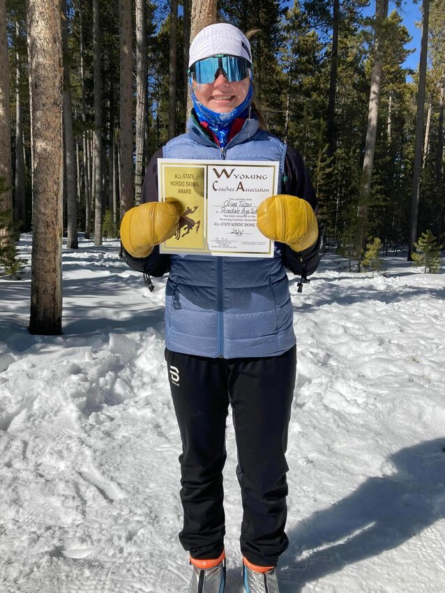 Sophomore Olivia Tolson shows off her certificate for First-Team All-State honors following the Wyoming Nordic Skiing State Championships on Casper Mountain.