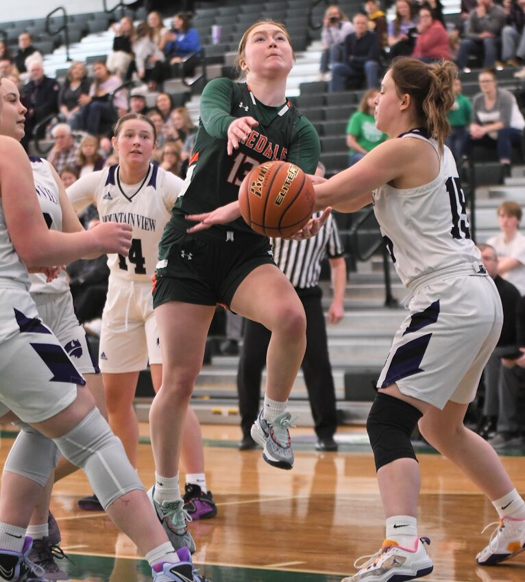 Junior Gabby Rogers, No. 13, battles against a group of opponents from Mountain View. Rogers earned 3A All-State honors and 3A West All-Conference accolades.