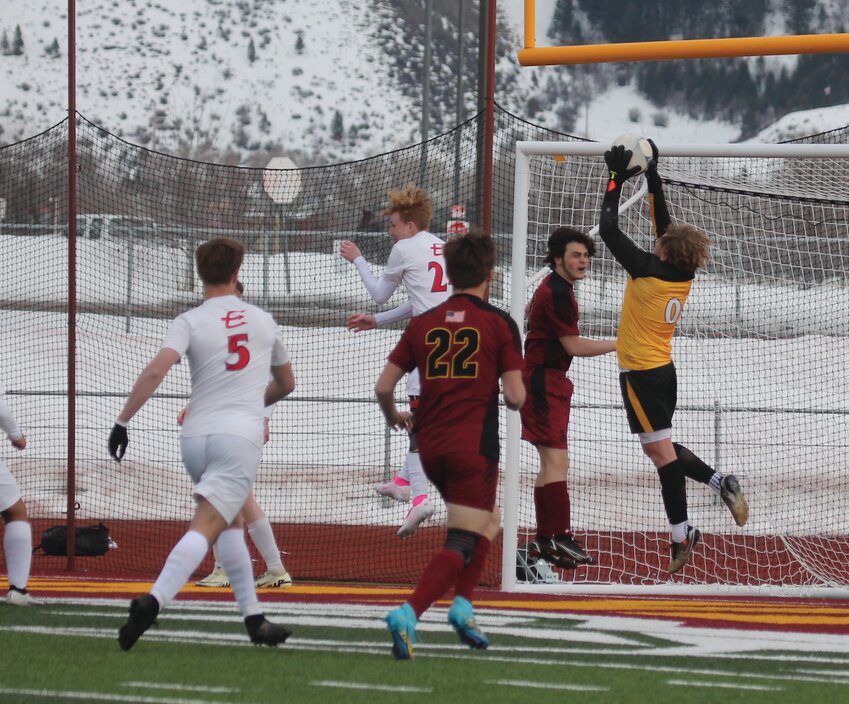 Red Devils goalkeeper Jaeger Liechty makes a nice save on a corner kick Thursday against Star Valley in a 3-0 loss to the Braves. Evanston will host Rock Springs Friday at Kay Fackrell Stadium.