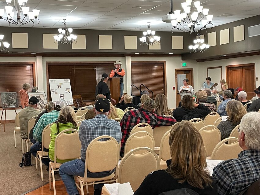 Auctioneer Dave Stephens works the crowd of about 70 folks during the Green River Valley Museum’s 2024 Hard Hats and Stetson’s fundraiser. The group raised more than $10,000 to restore the the Old Texaco building in Big Piney.