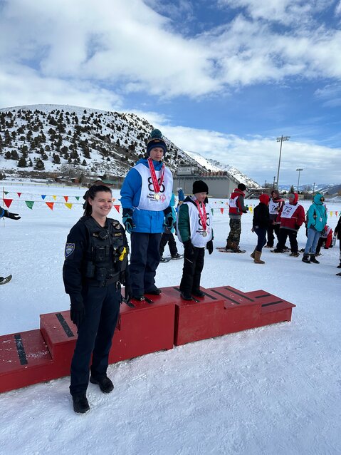 Ian Jones, center, and Scott Covill, right, take the podium to show off their gold and silver medals following cross-country ski 100-meter races at the State Special Olympics Winter Games in Jackson.