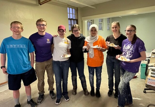 Janelle Sawaya helps paint the interior of the Hamsfork Museum thanks to the local Rotary Club and fellow volunteers from the KHS Interact group.