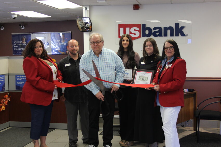 The Evanston Chamber of Commerce Red Carpet Ambassadors welcome US Bank with a ribbon cutting on Wednesday, Sept. 25. Pictured are Lexi Lamb, US Bank client relationship consultant Jake Zufelt, branch manager Paul VanDreew, client relationship consultants Tara Pentz and Autumn Worthing and chamber executive director Tammy Staley.