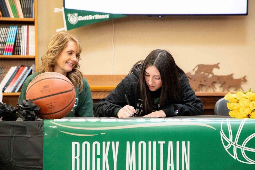 With mom Tamey Peternal looking on, Lady Ranger Senior Natasha Martinez signs her Letter of Intent to play hoops for Rocky Mountain College in Billings, Montana. Martinez will join older brother AQ Peternal, who plays football for the Battlin’ Bears.
