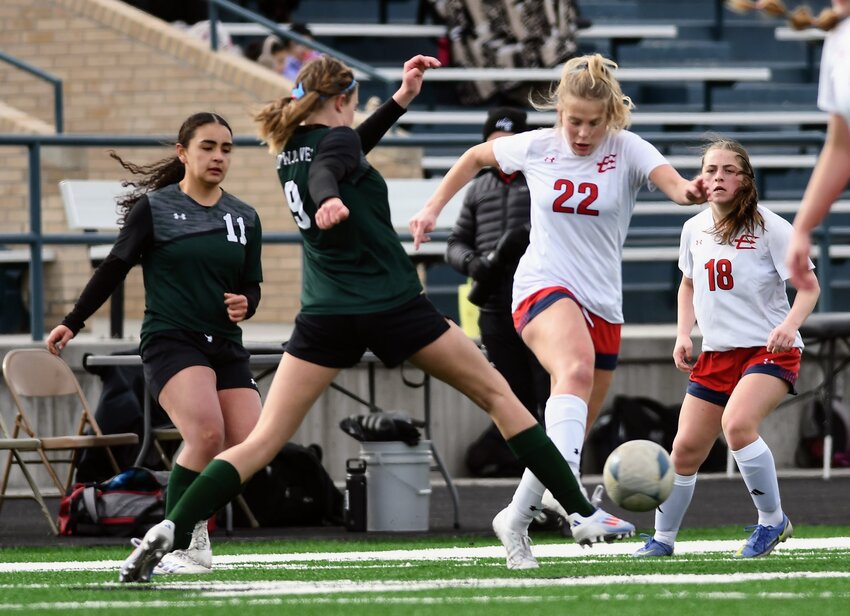 Lady Devils midfielder Kyrsten Hiatt battles Green River’s Athena Clement for possession during Friday’s 11-0 loss to the Lady Wolves. Hiatt was one of four freshmen that started for Evanston.