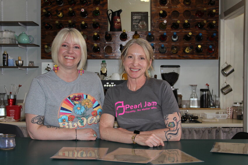 Gina Jones and Gina Black, owners of GiGi’s Coffeehouse, stand ready to serve customers. They were winners of a Jumpstart Evanston grant which they will use to buy a refrigerated chef prep table.