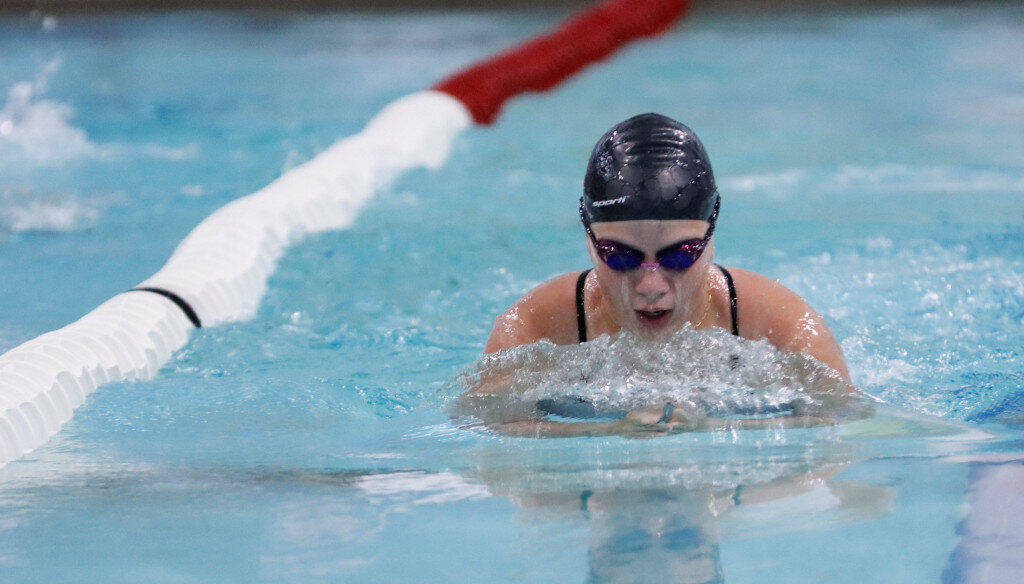 Joan Mitchell photo
Sophomore Kamia Runyan comes up for air in the breaststroke at Red and White Days on Aug. 18. Runyan and her teammates kicked off the fall season with a busy weekend in Lander.