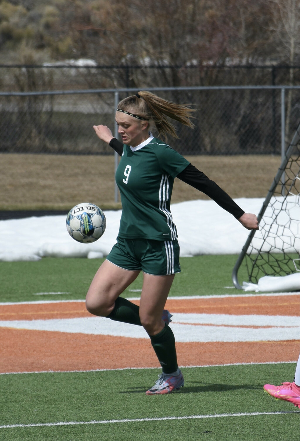 Robert Galbreath photo
Sophomore Cora Koci maneuvers the ball away from Pinedale’s goal area during the April 27 varsity game against Lander.