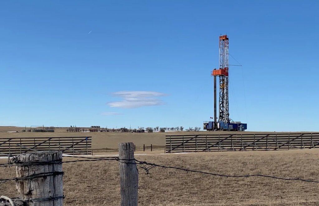 Dustin Bleizeffer/WyoFile photo
A rig drills near a ranch home in the southern Powder River Basin in December 2019.