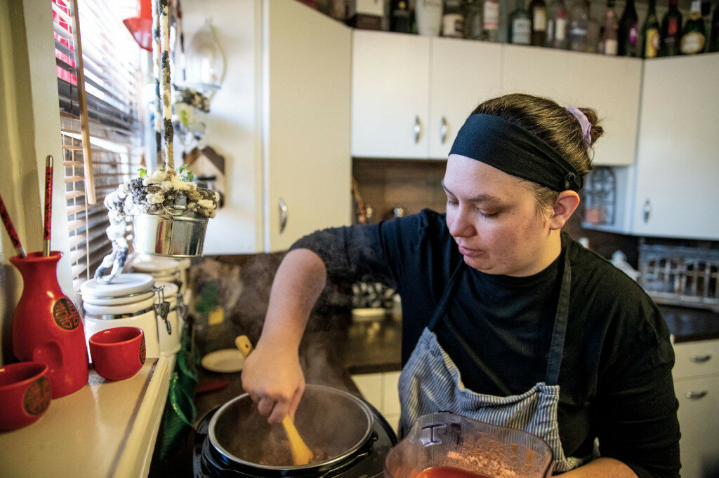 Mike Moore, Gillette News Record photo
Kasi Hartsoch stirs chili in her home while preparing food for her YouFeed home kitchen business, Kasi’s Home Kitchen, last month.