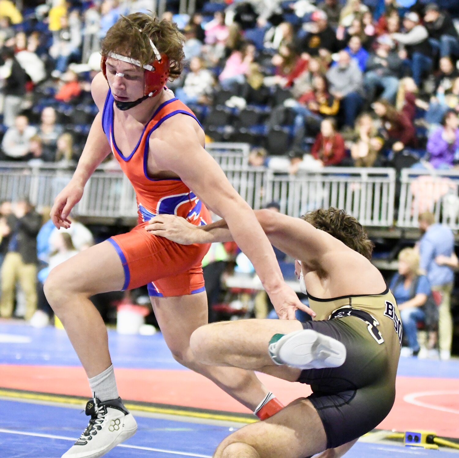 Red Devil wrestler Brady Roberts scores an escape point from Buffalo’s Hazen Camino during the 175-pound championship match at the 3A State Wrestling Championships in Casper. Roberts won the State Championship with a 3-0 decision.
