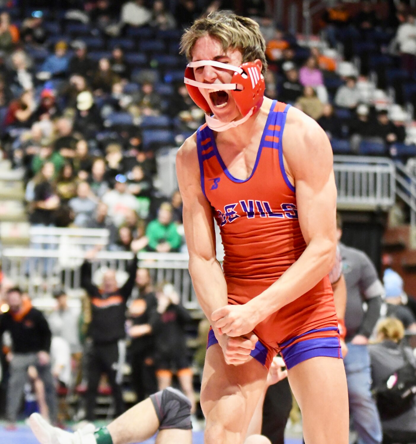 Red Devil senior Ryder Wilson celebrates after securing a spot on the podium at 132 pounds Friday at the 3A State Wrestling Championships in Casper. Wilson finished fifth overall.