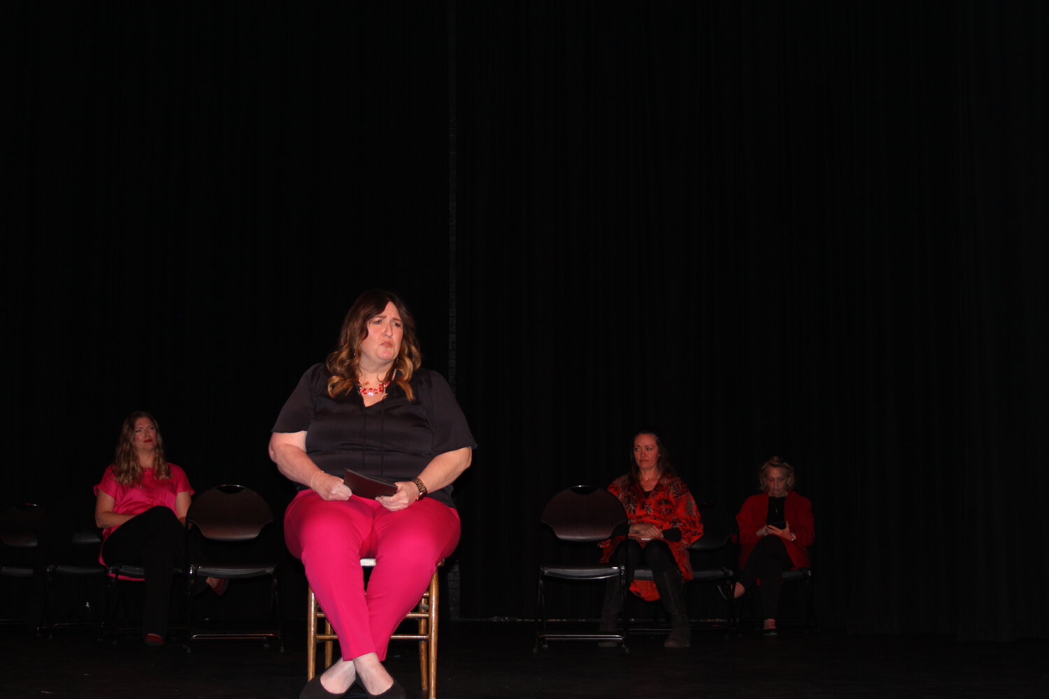 Aimee Cogger performs during the Soroptimist’s production of “The Vagina Monologues,” held Saturday, Feb. 24, at the Strand Theatre.
