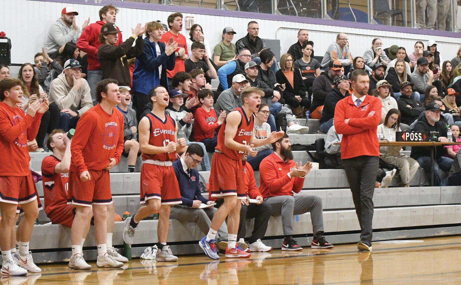 The Red Devils bench celebrates, while Rock Springs fans look on in dismay, as Evanston beat the Tigers 49-41 Saturday to advance to the 4A State Basketball Tournament this weekend in Casper. It’s the first trip to State for the program in the Rob Watsabaugh era.