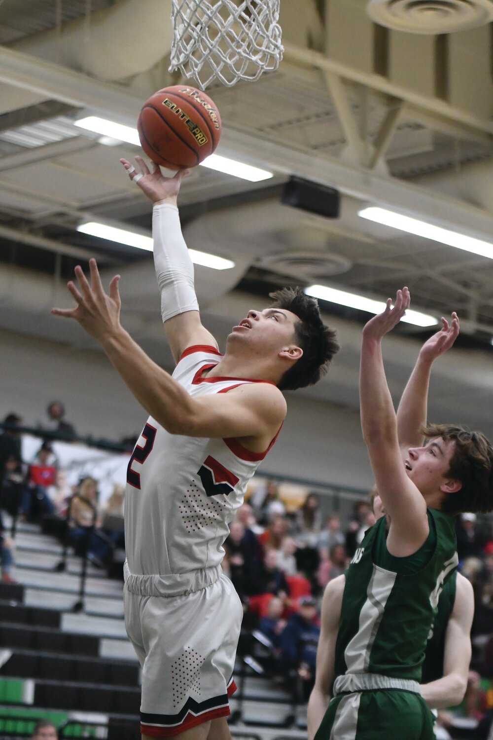 Senior Cohen Morrow makes a strong move to the basket during Friday’s 51-38 win over Kelly Walsh.