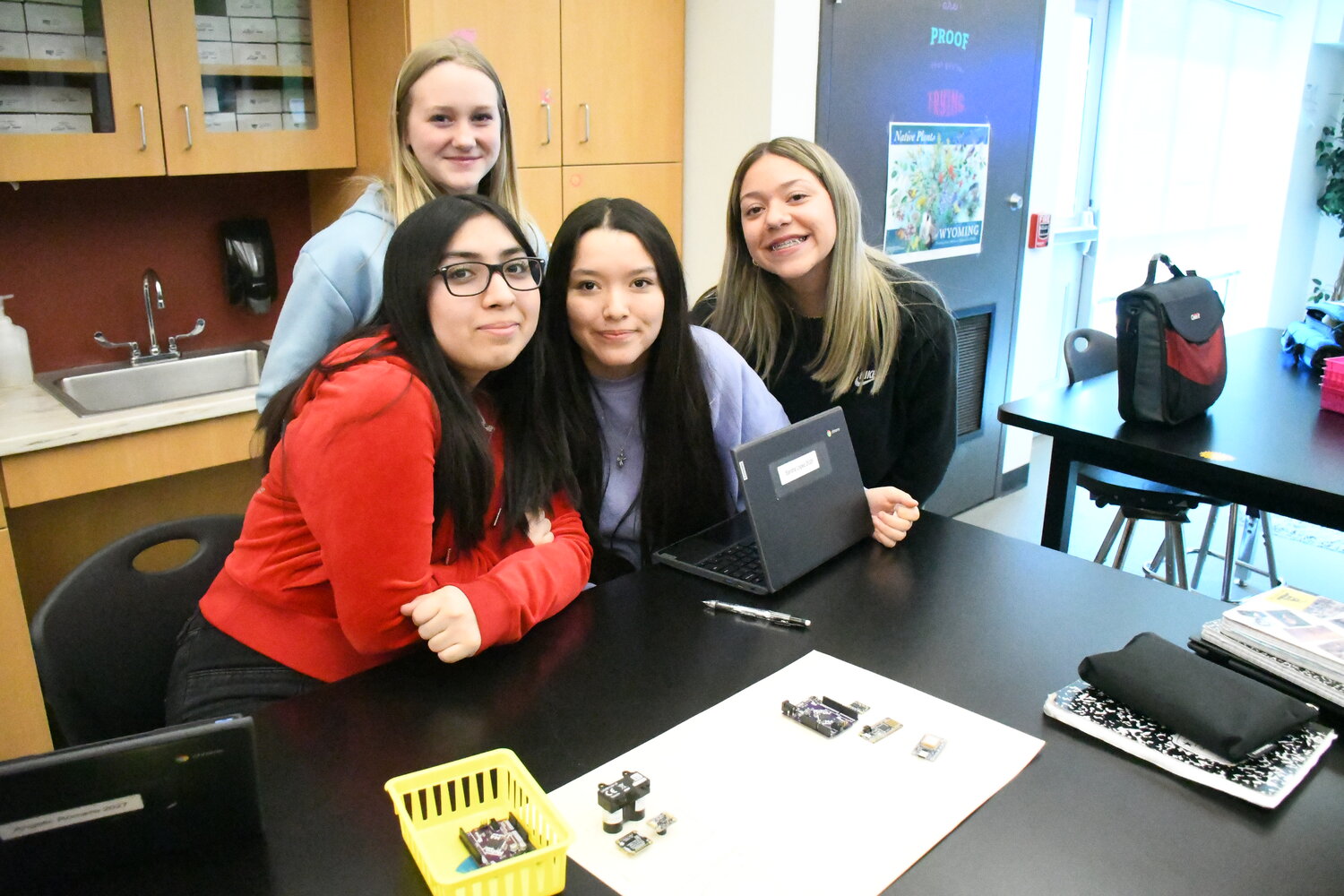 “I wasn’t really into this stuff [STEM] before, but doing this with TechRise has opened my mind into wanting to look into it more,” said Sofia Zarate. Posing with the class’s rocket-powered lander components are: Raegan Roetker, Angelic Romero, Sandra Lopez and Sofia Zarate.