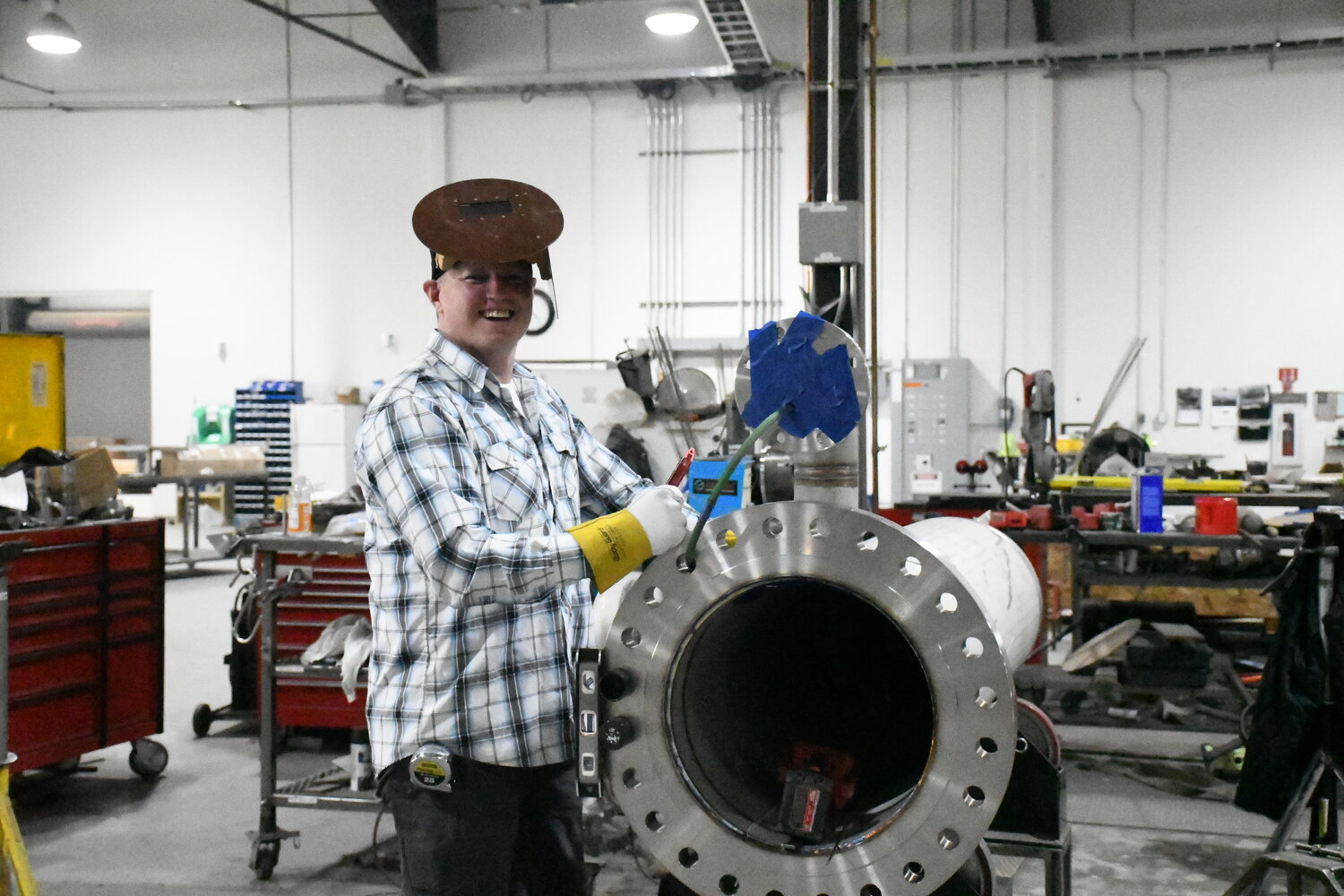 Special Projects Quality Manager Kenny Oldham tig welds a pump pot at Clean Energy.  The outfit manufactures products for liquid natural gas and is expanding into the renewable energy gas sector.