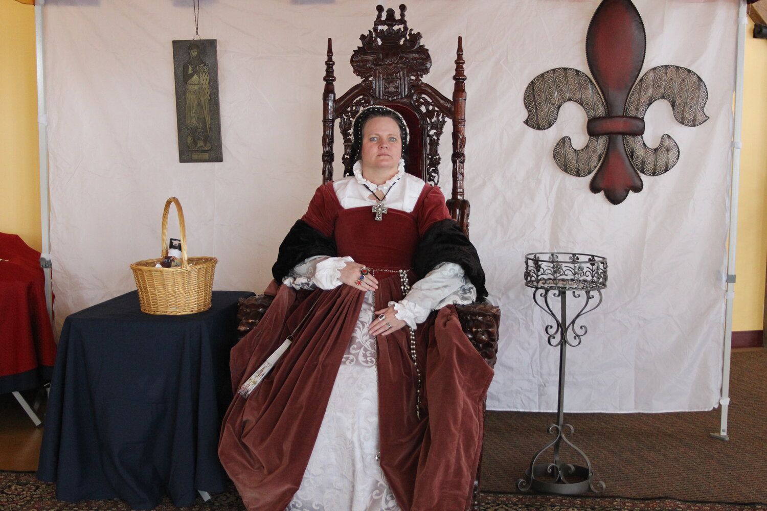Robyn Rawlins from Utah portrays Queen Mary of England and Spain in the upstairs loft in the Roundhouse, where the children’s games are held. She is with the Utah Renaissance Faire which is held in August.