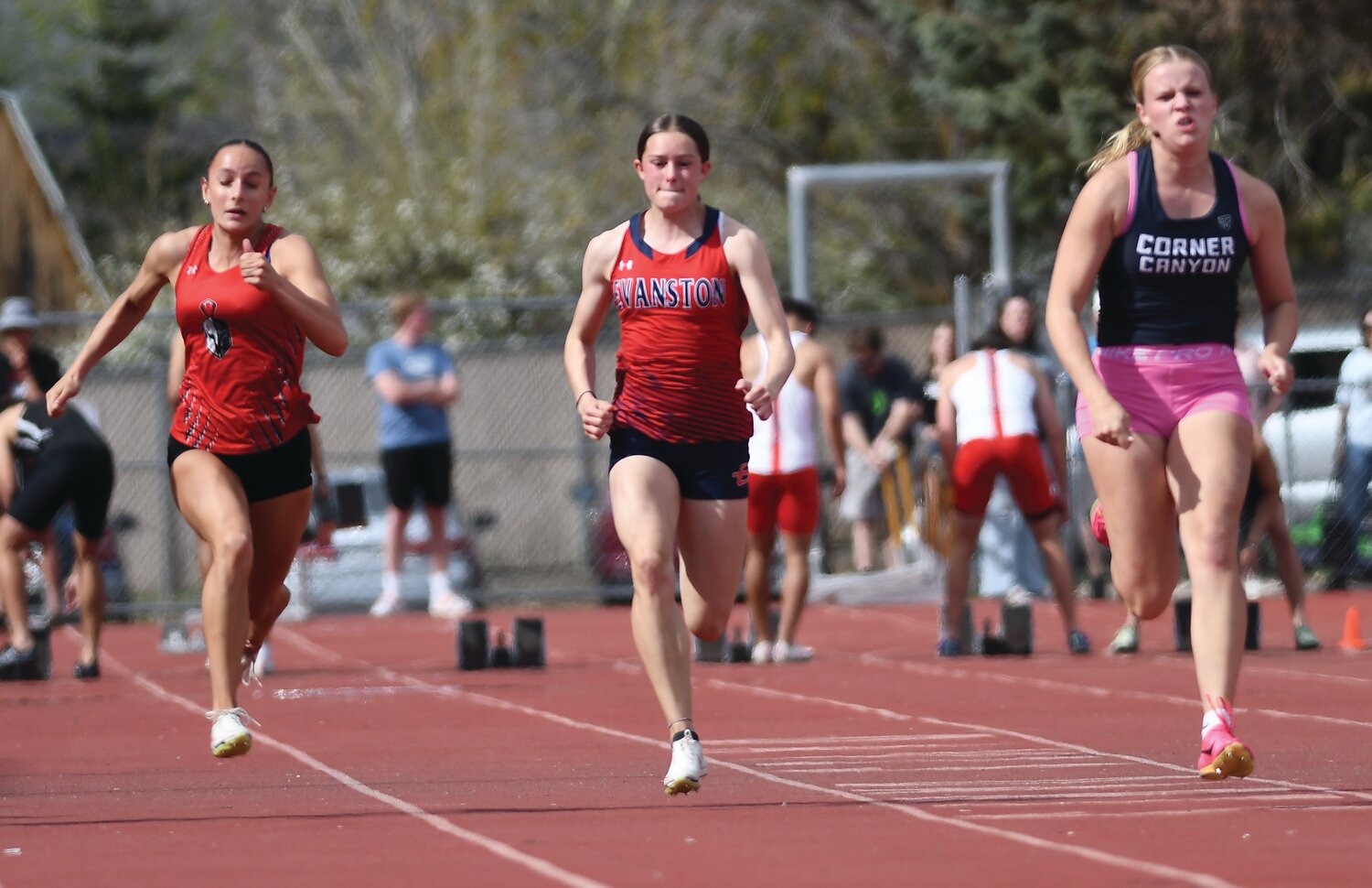 Lady Devil sprinter Talia Conrad finished third in the invited 100 meters (above), and sixth in the 200 meters at Saturday’s Davis Invitational, in Kaysville, Utah. The EHS track and field teams hosted their home invitational on Tuesday at Kay Fackrell Stadium.